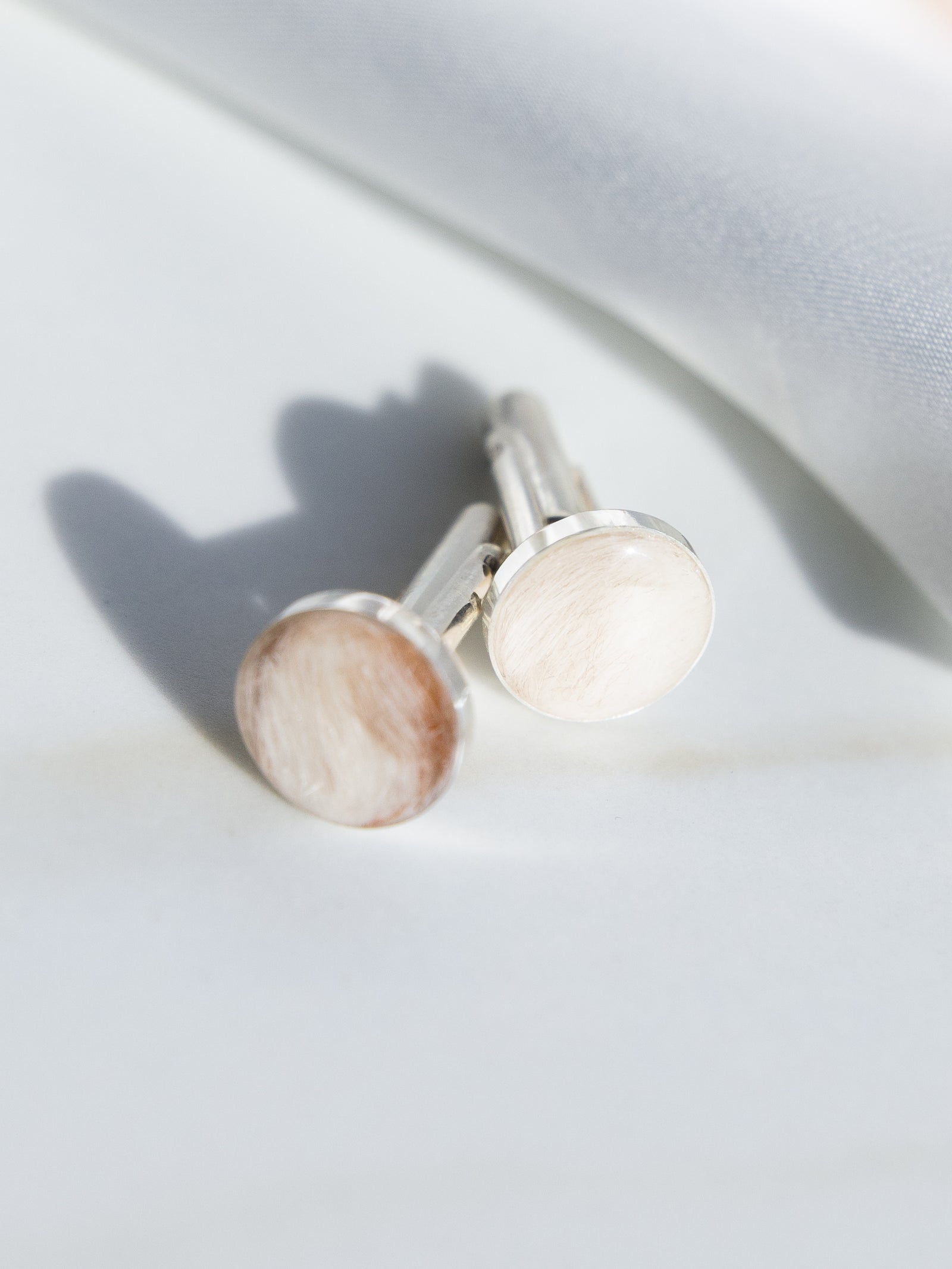 Pale pet fur preserved within handmade keepsake jewellery